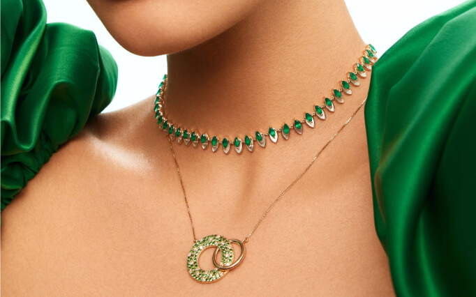 Woman wearing diamond pendant necklace